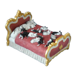 Des chats sur un lit